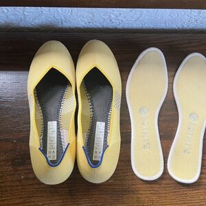 Rothy's Vibrant Yellow Flats with Blue Trim